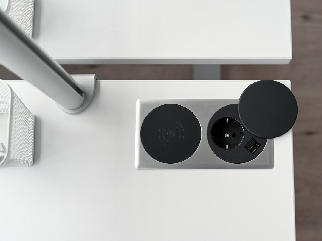 Bright collaborative open-plan office workspace with wooden desks